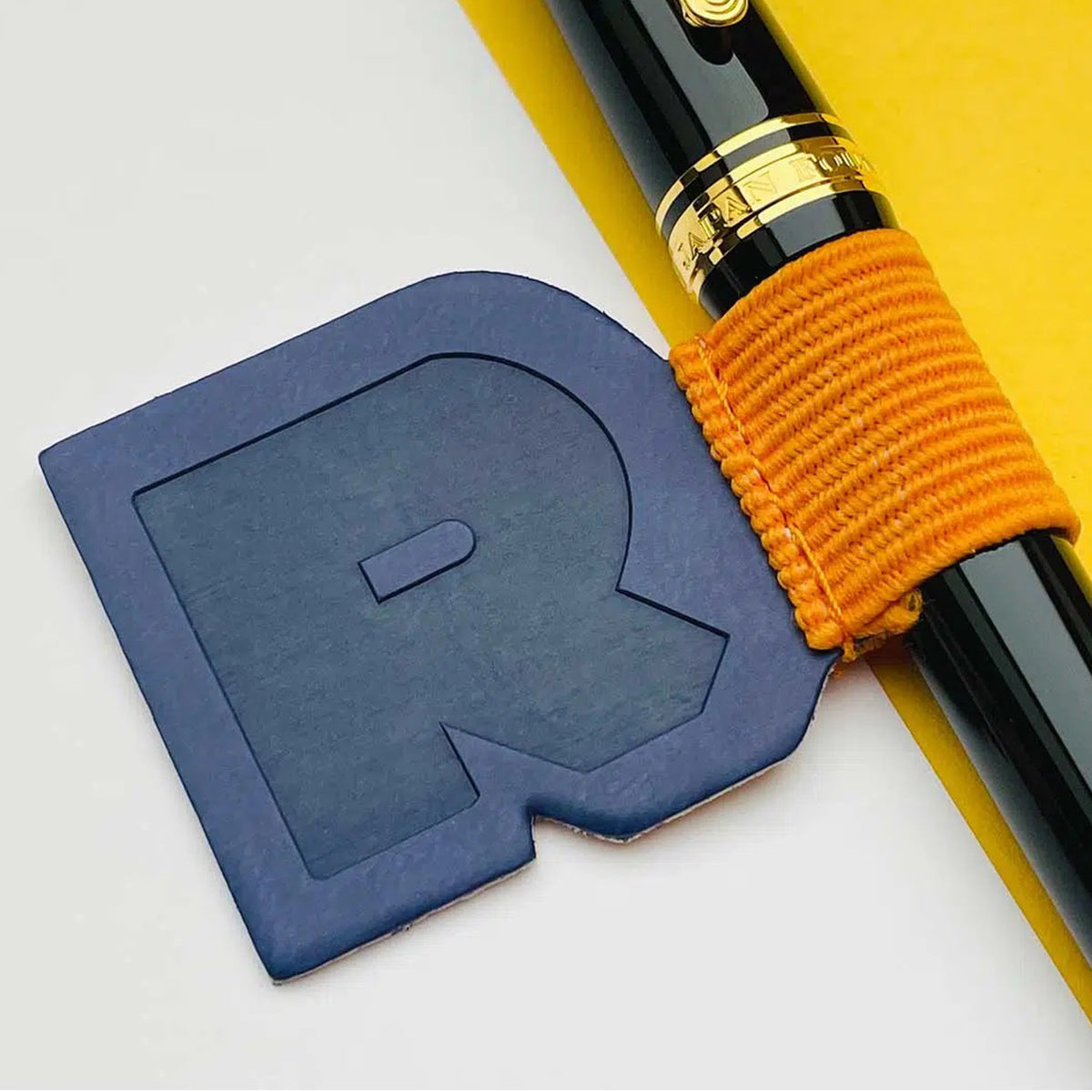 Adhesivo porta plumas Rhodia